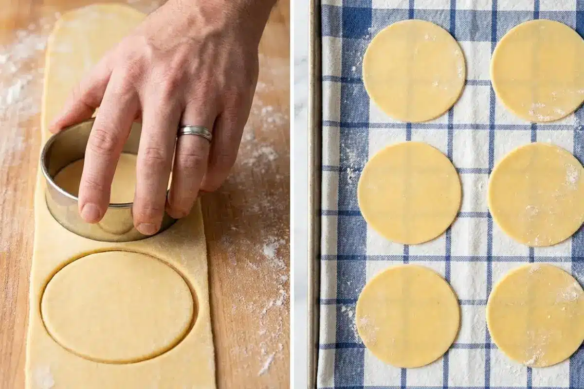 How to Make Cannoli with Ricotta & Chocolate Chips Step by Step A side-by-side view showing a hand pressing a round metal cutter into flat pastry dough on a flour-dusted wooden board, and the resulting smooth circles of dough resting on a cozy blue-and-white checkered towel, ready to become shells for cannoli with ricotta and chocolate chips.